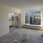 woonkamer stucen nar brand